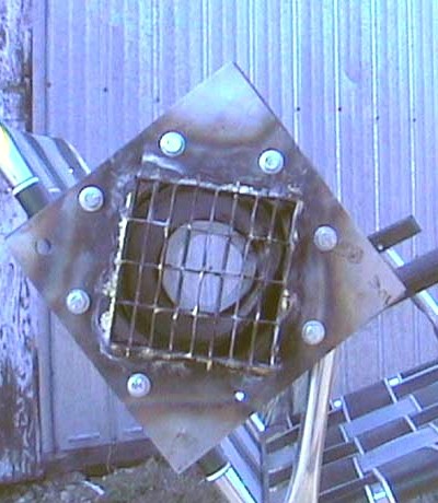 Looking down the pipe through the mounted valve plate (c) 2003 Mike Kirney