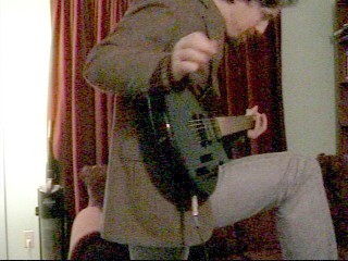 Mike Kirney grooving on guitar (c) 2003 Mike Kirney
